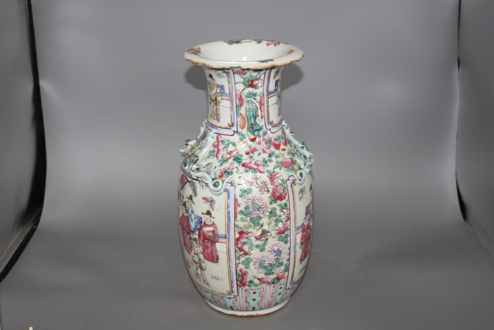 A 19th Chinese famille rose vase, decorated with panels of noblemen and attendants, height 35cm